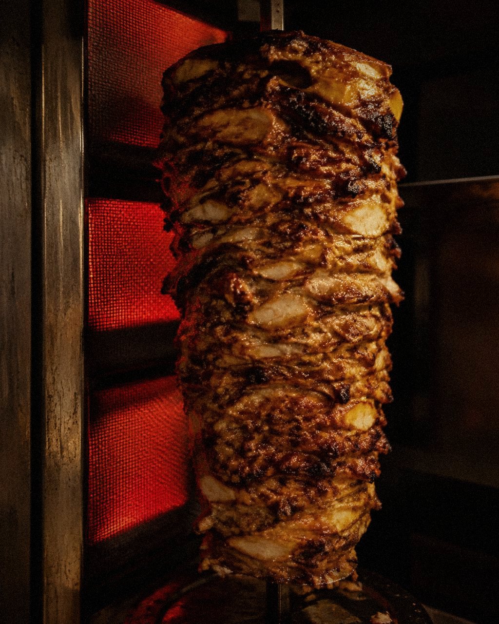 Chicken shawarma turning on the spit